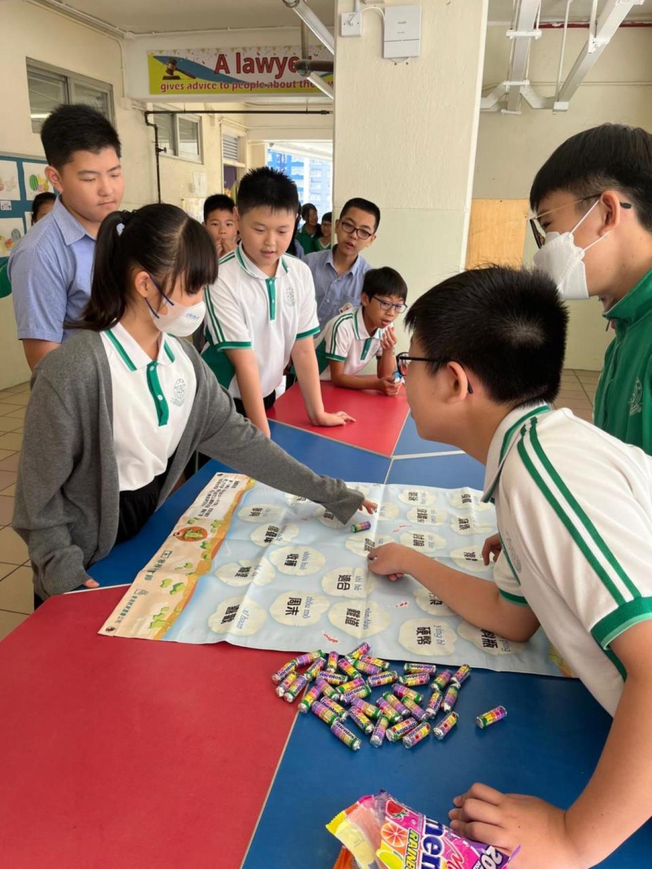 通過攤位遊戲提升高年級學生學習普通話的興趣